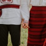 a couple of people wearing matching outfits